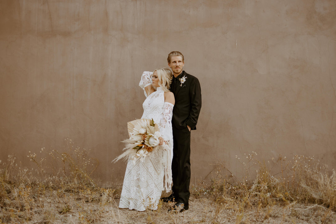 Dreamy boho wedding couple with bride in beautiful lace gown - Buena Vista Colorado wedding inspiration